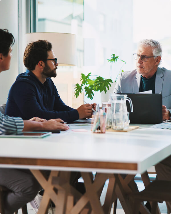 Bright Arrow advisor working alongside a senior leader inside a live business challenge