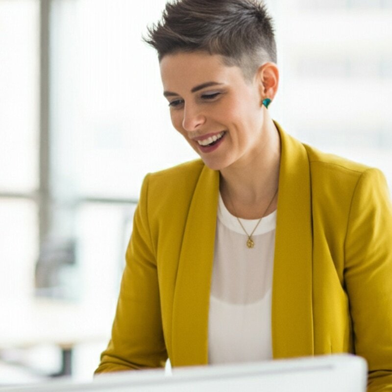 Senior female executive engaged in a focused conversation, bringing confidence and clarity to a high-stakes leadership discussion